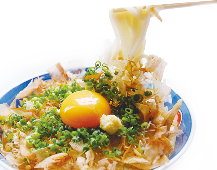 Boiled Udon noodles with raw egg and soy sauce